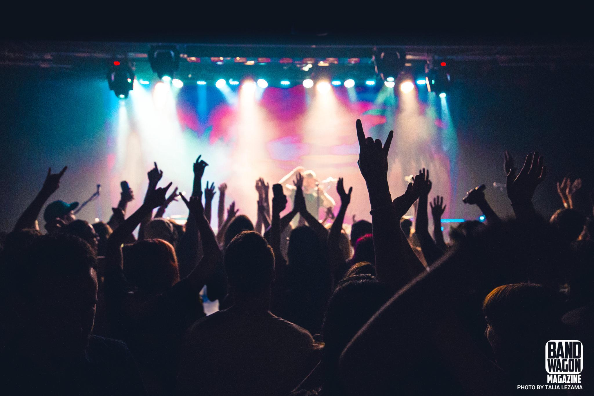 Rooney performing to a packed Moxi Theater crowd on July 21, 2017